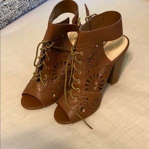 Brown laced up heels